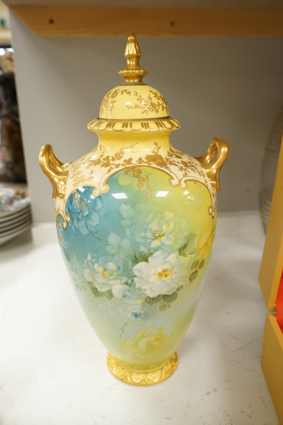 A pair of Bonn floral vases and covers, a modern Meissen vase, and an encrusted Sitzendorf vase, largest 35cm high